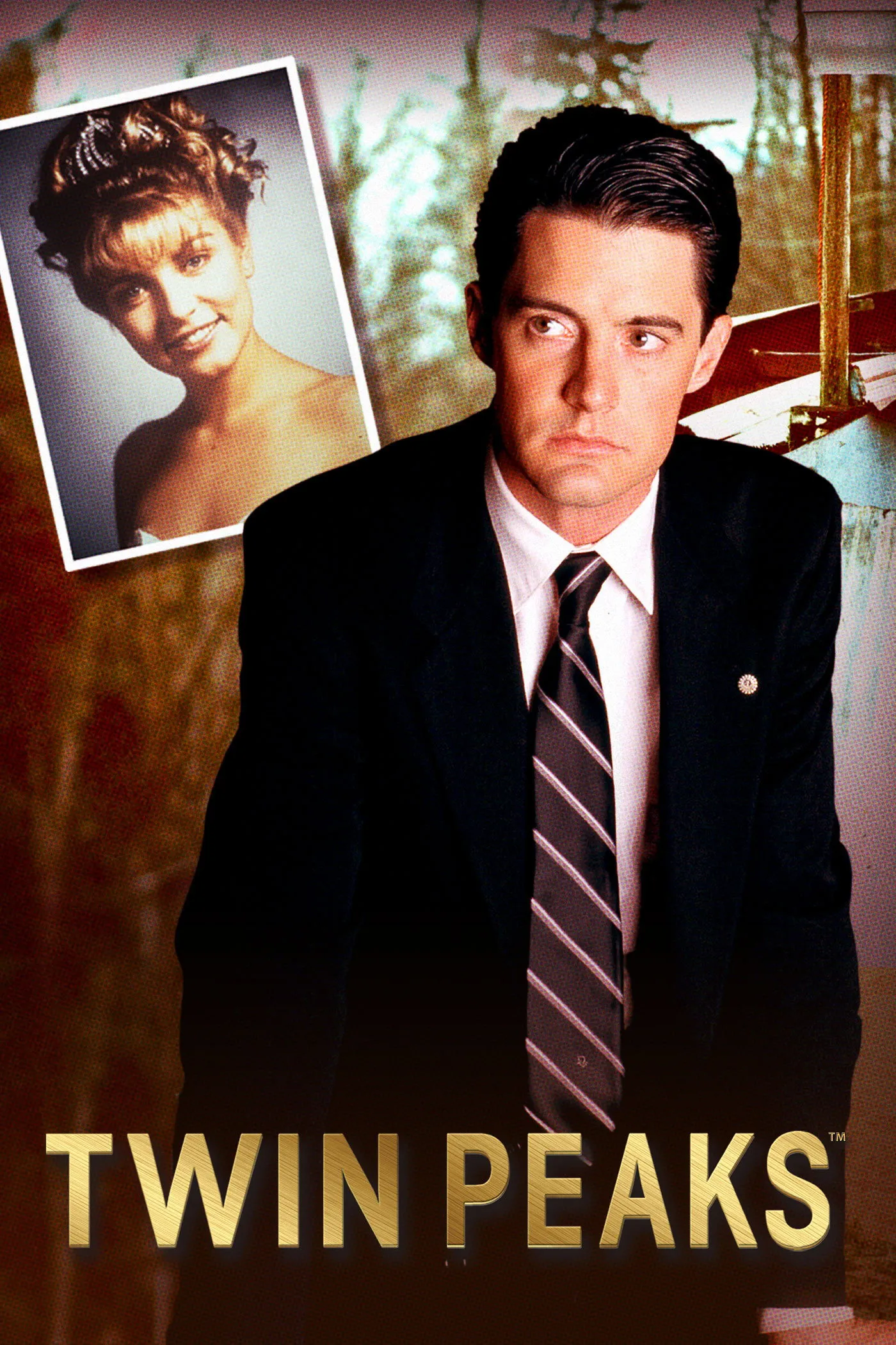 A poster of Twin Peaks featuring Laura Palmer's photo and Agent Dale Cooper